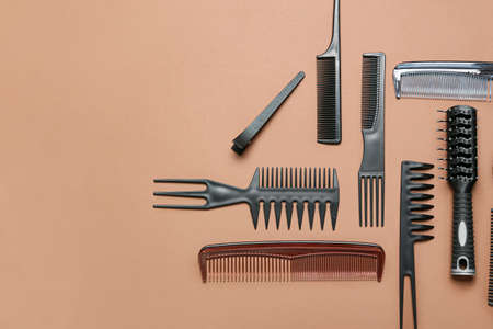 Set of hairdresser's tools on color backgroundの写真素材