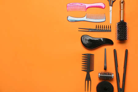 Set of hairdresser's tools on color backgroundの写真素材