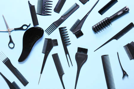 Set of hairdresser's tools on color backgroundの写真素材