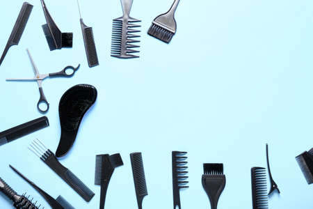 Set of hairdresser's tools on color backgroundの写真素材