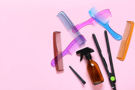 Set of hairdresser's tools on color backgroundの写真素材