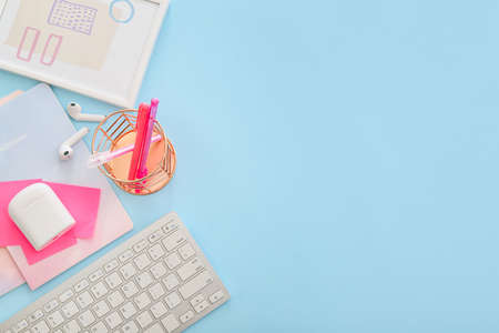 Modern devices with stationery and frame on color backgroundの写真素材