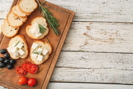 Sandwiches with feta cheese on white wooden backgroundの写真素材