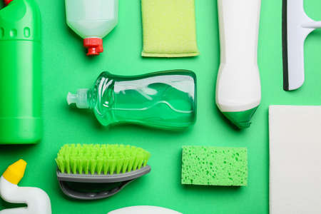 Set of cleaning supplies on color backgroundの写真素材