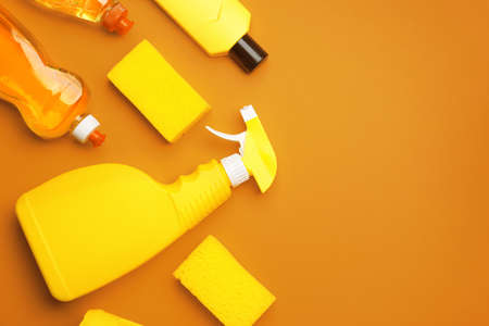 Set of cleaning supplies on color backgroundの写真素材