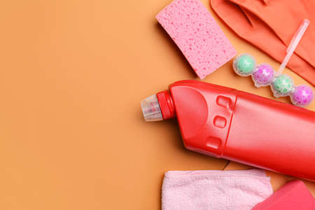 Set of cleaning supplies on color backgroundの写真素材