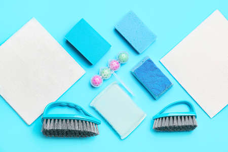 Set of cleaning supplies on color backgroundの写真素材