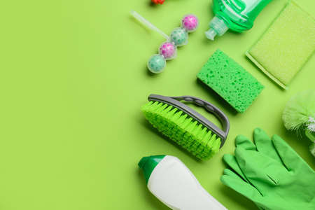 Set of cleaning supplies on color backgroundの写真素材