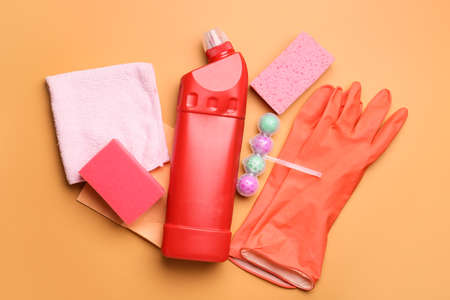 Set of cleaning supplies on color backgroundの写真素材