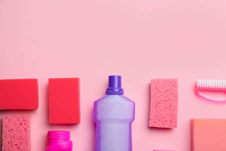 Set of cleaning supplies on color backgroundの写真素材