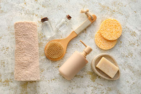 Composition with sponges and bath supplies on grunge background