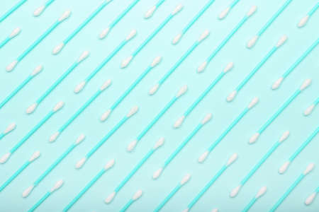 Cotton swabs on color backgroundの写真素材