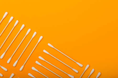 Cotton swabs on color backgroundの写真素材