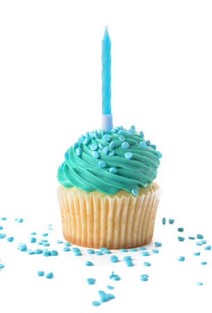 Tasty Birthday cupcake and candle on white backgroundの写真素材