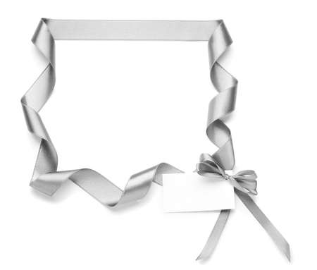 Frame made of silver ribbon on white backgroundの写真素材