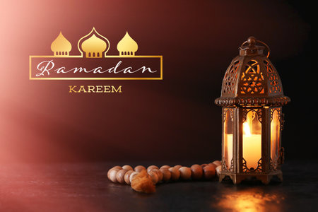 Beautiful greeting card for Ramadan celebration with Muslim lampの写真素材