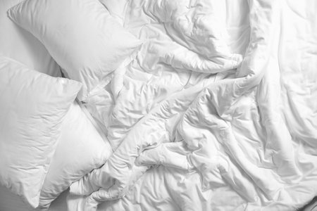 Clean white bedding, top viewの写真素材