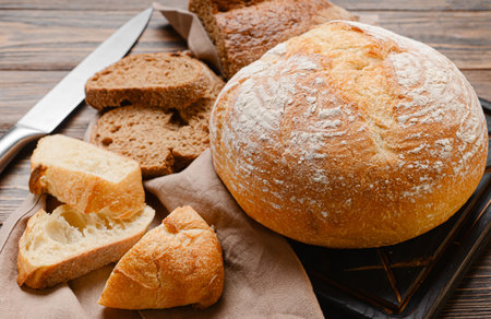 fresh bread on wooden background
