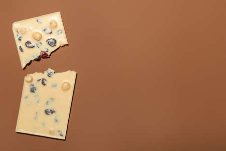 Tasty chocolate bar on color backgroundの写真素材