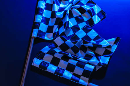 Racing flags on dark color backgroundの写真素材
