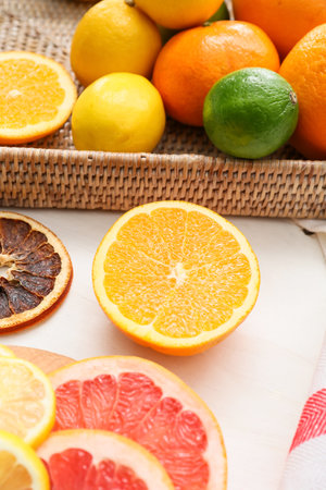 Different citrus fruits on light background, closeupの写真素材