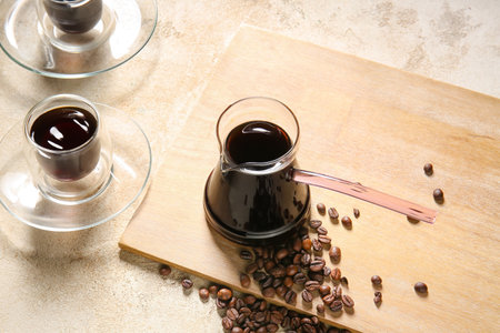 Pot of hot coffee on table