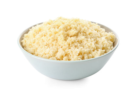 Bowl with tasty couscous on white backgroundの写真素材