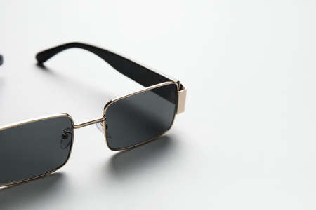 Stylish sunglasses on light backgroundの写真素材