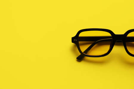 Stylish sunglasses on color background, closeupの写真素材