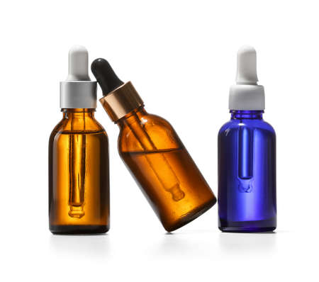 Cosmetic dropper bottles on white backgroundの写真素材