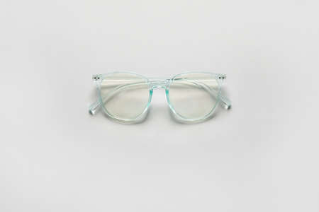 Stylish eyeglasses on light backgroundの写真素材