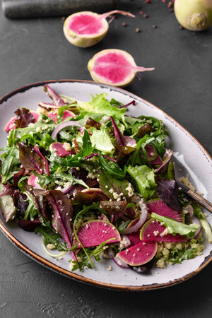 Plate with couscous and vegetables on dark background, closeupの写真素材