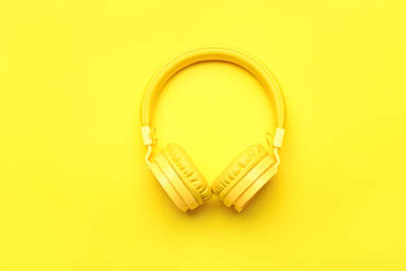 Stylish headphones on color backgroundの写真素材