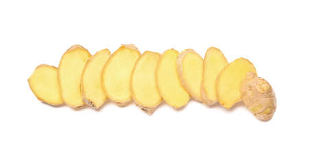 Slices of fresh ginger on white backgroundの写真素材