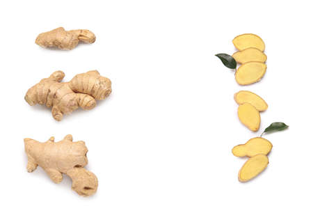 Fresh ginger with slices on white backgroundの写真素材