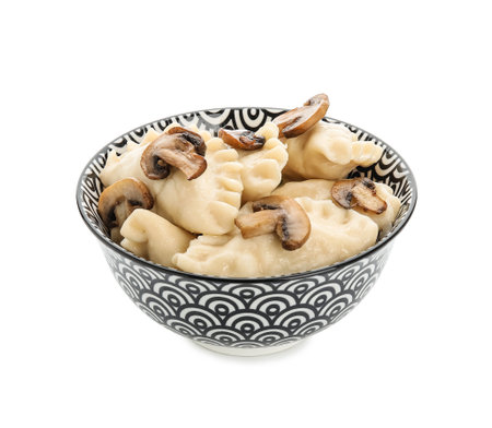 Bowl with tasty dumplings on white backgroundの写真素材