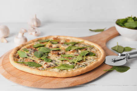Delicious vegetarian pizza on wooden backgroundの写真素材