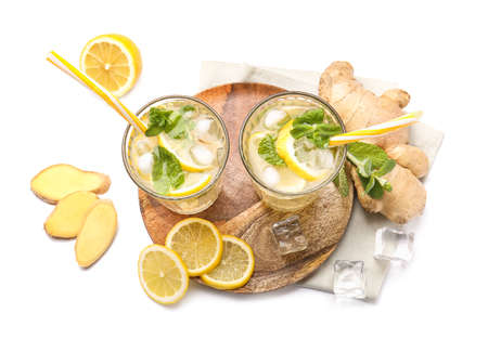 Glasses of cold ginger lemonade on white backgroundの写真素材