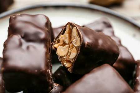 Tasty chocolate candies with nuts, closeupの写真素材