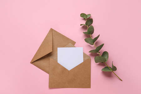 Envelopes with blank card on color backgroundの写真素材