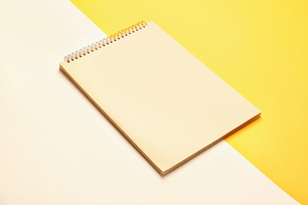 Blank open notebook on color backgroundの写真素材