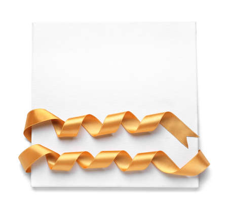 Blank board with golden ribbons on white background