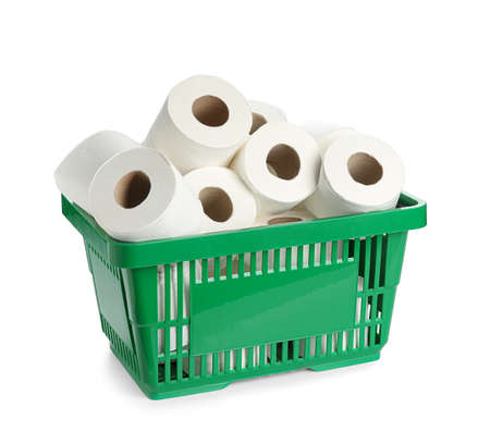 Shopping basket with rolls of toilet paper on white backgroundの写真素材