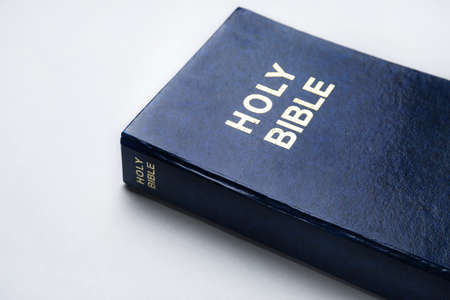 Holy Bible on light background, closeup
