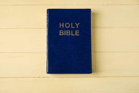 Holy Bible on wooden backgroundの写真素材