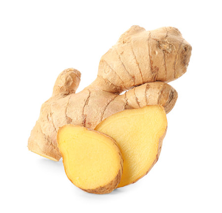 Fresh ginger with slices on white backgroundの写真素材