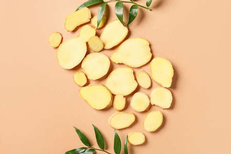 Composition with fresh ginger on color backgroundの写真素材