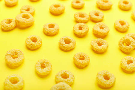 Tasty cereal rings on color backgroundの写真素材