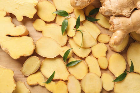 fresh ginger on wooden backgroundの写真素材