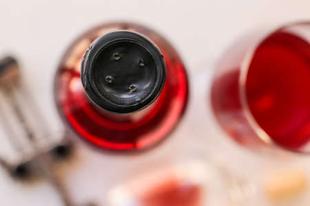 Bottle of exquisite wine on light table, closeupの写真素材